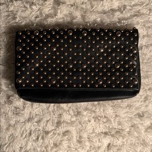 Black studded clutch